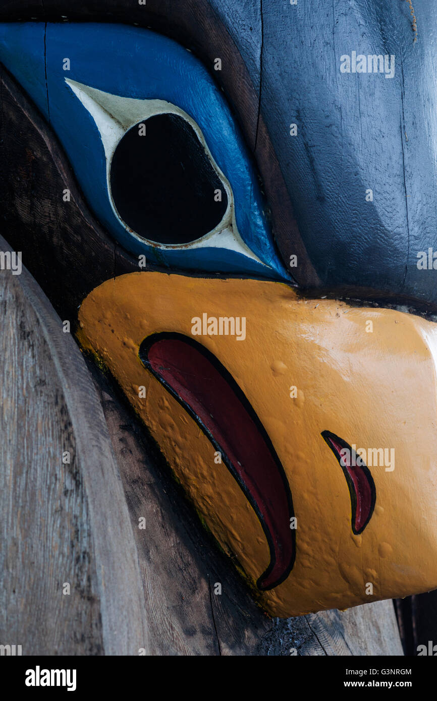 Beak and eye of a bird carving on a totem pole, Duncan, Vancouver Island, British Columbia, Canada Stock Photo