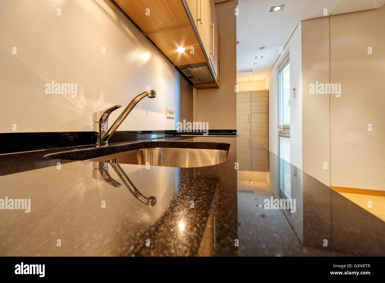 modern kitchen interior with sink and appliances Stock Photo - Alamy