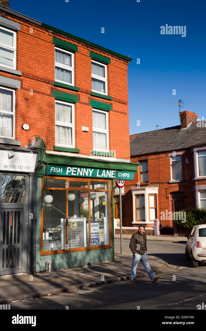 Merseyside, Liverpool, Beatles History, Penny Lane, shops, man crossing road at Chip Shop Stock Photo
