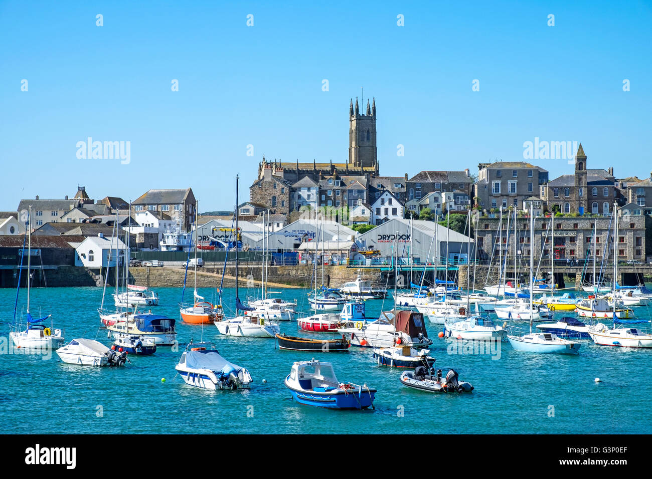 Boast in the harbour at high tide in Penzance, Cornwall, England, UK Stock Photo