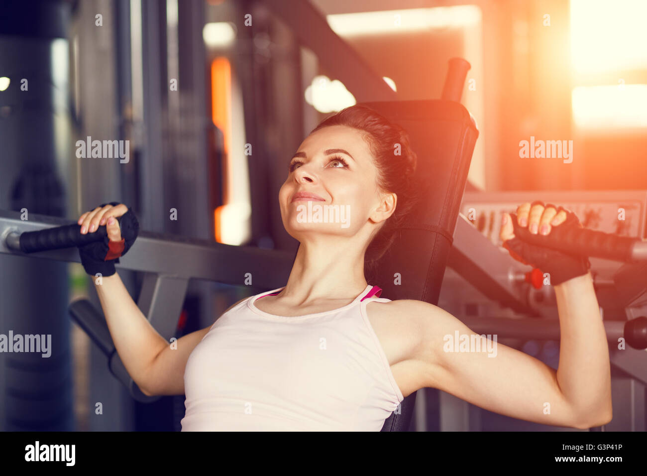 Woman working arms chest gym hi-res stock photography and images - Alamy