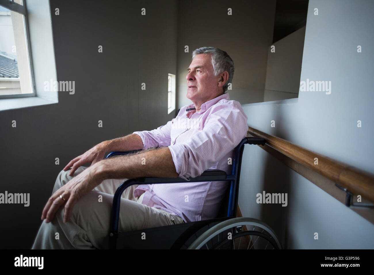 Old man wheelchair thinking hi-res stock photography and images - Alamy