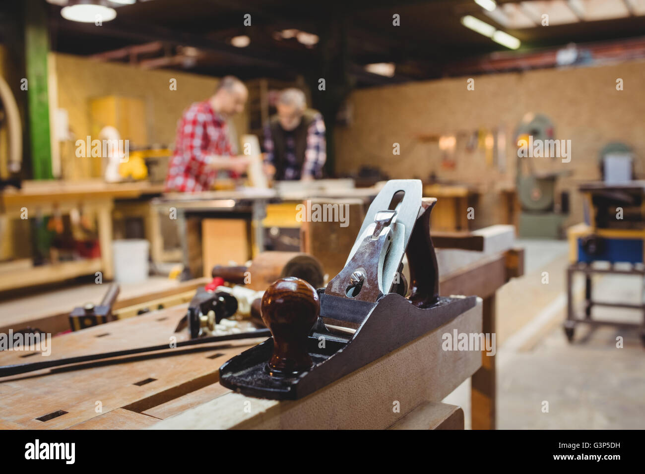 Carpenters reading a work plan Stock Photo Alamy