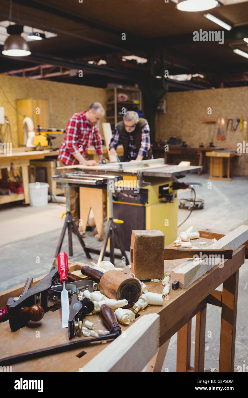 Carpenters reading a work plan Stock Photo Alamy