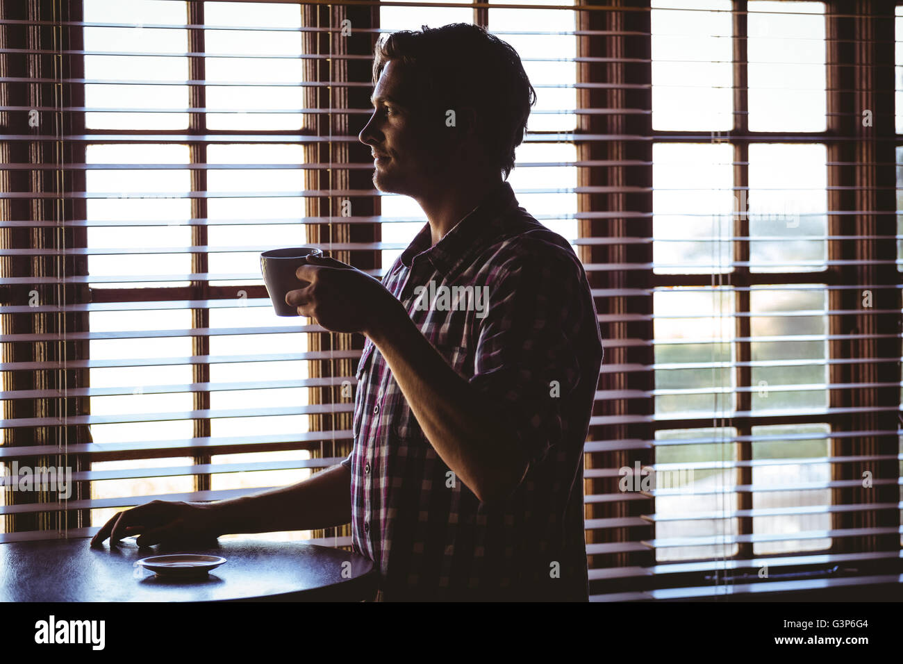 Man drinking alone a coffee Stock Photo