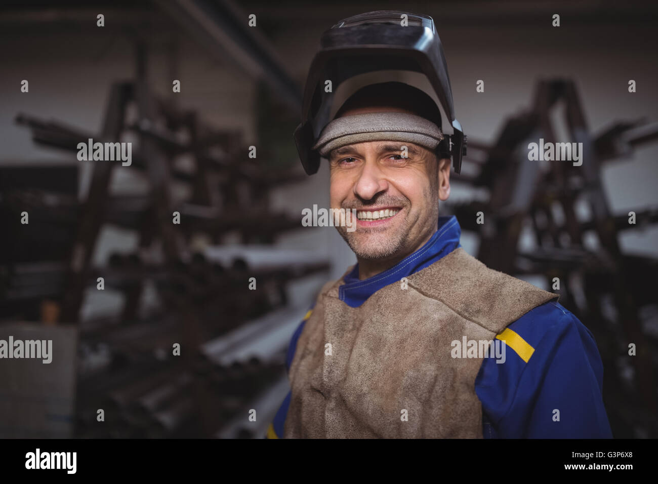 Portrait of worker standing in workshop Stock Photo