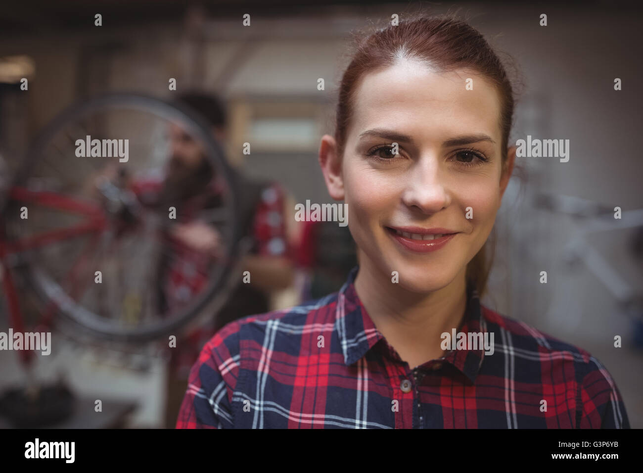 Close up of woman mechanic smiling Stock Photo