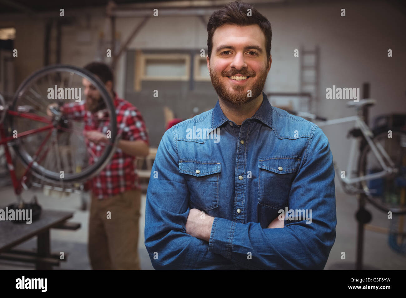 Portrait of man mechanic smiling Stock Photo