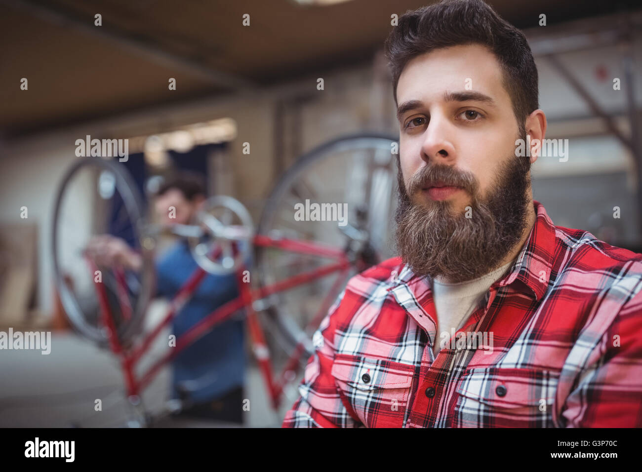Portrait of mechanic looking at camera Stock Photo