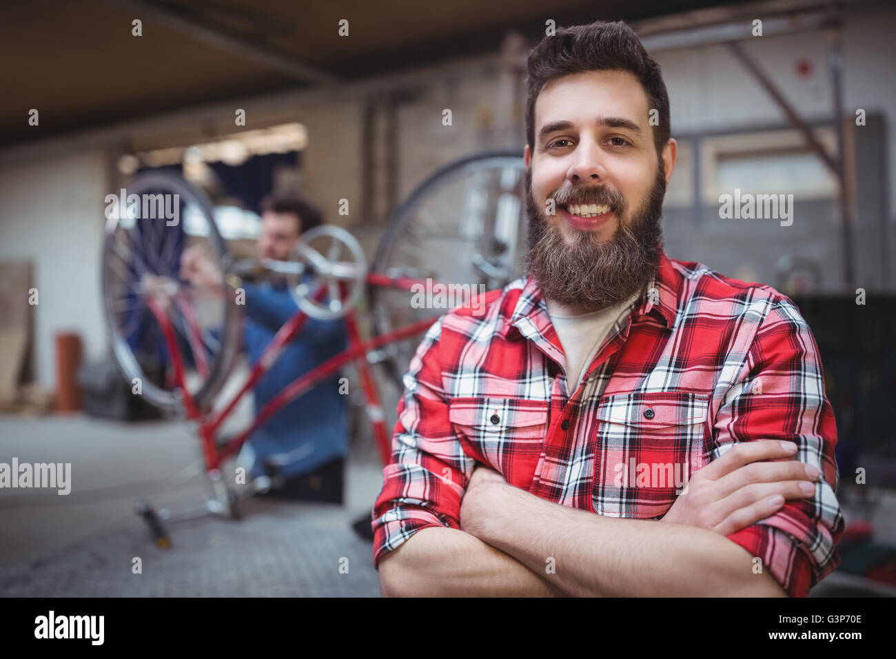 Portrait of mechanic smiling and posing Stock Photo