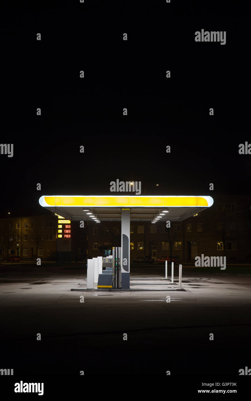 Sweden, Skane, Malmo, Ostra Hamnen, Gas station at night Stock Photo