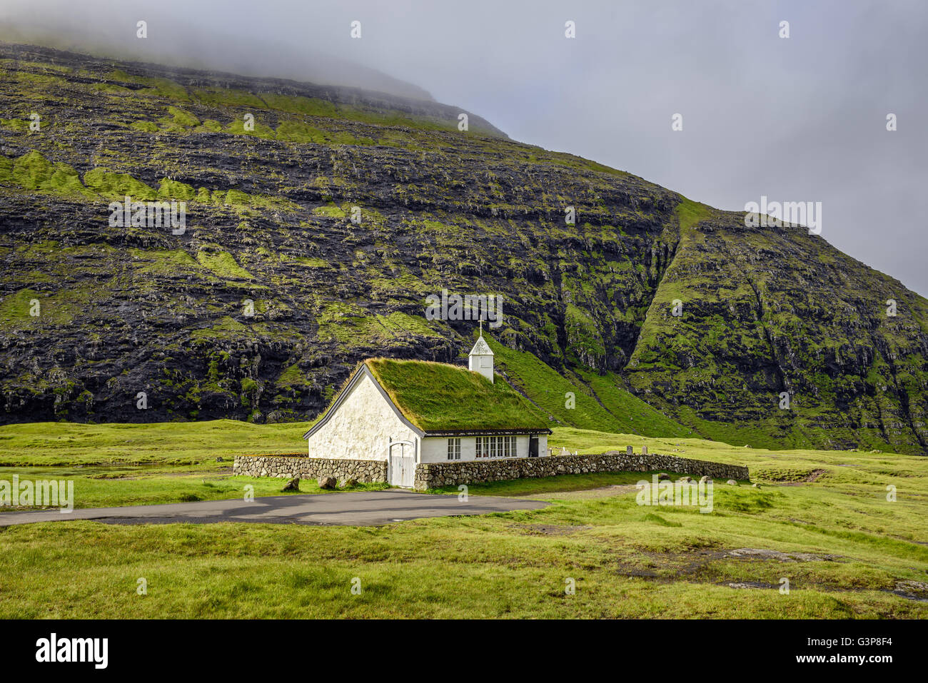 Small village church in Saksun on the island of Streymoy, Faroe Islands, Denmark Stock Photo