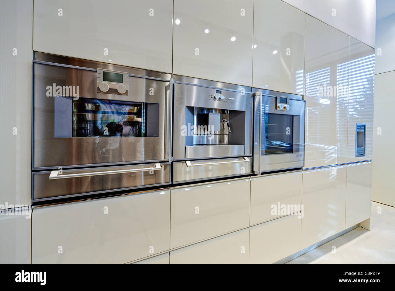 Modern kitchen interior with stainless steel sink and appliances Stock ...