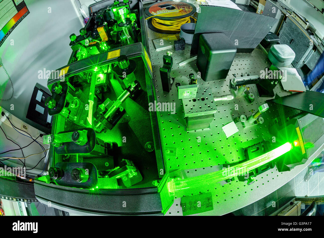 Green laser on optical table in a quantum optics lab Stock Photo Alamy