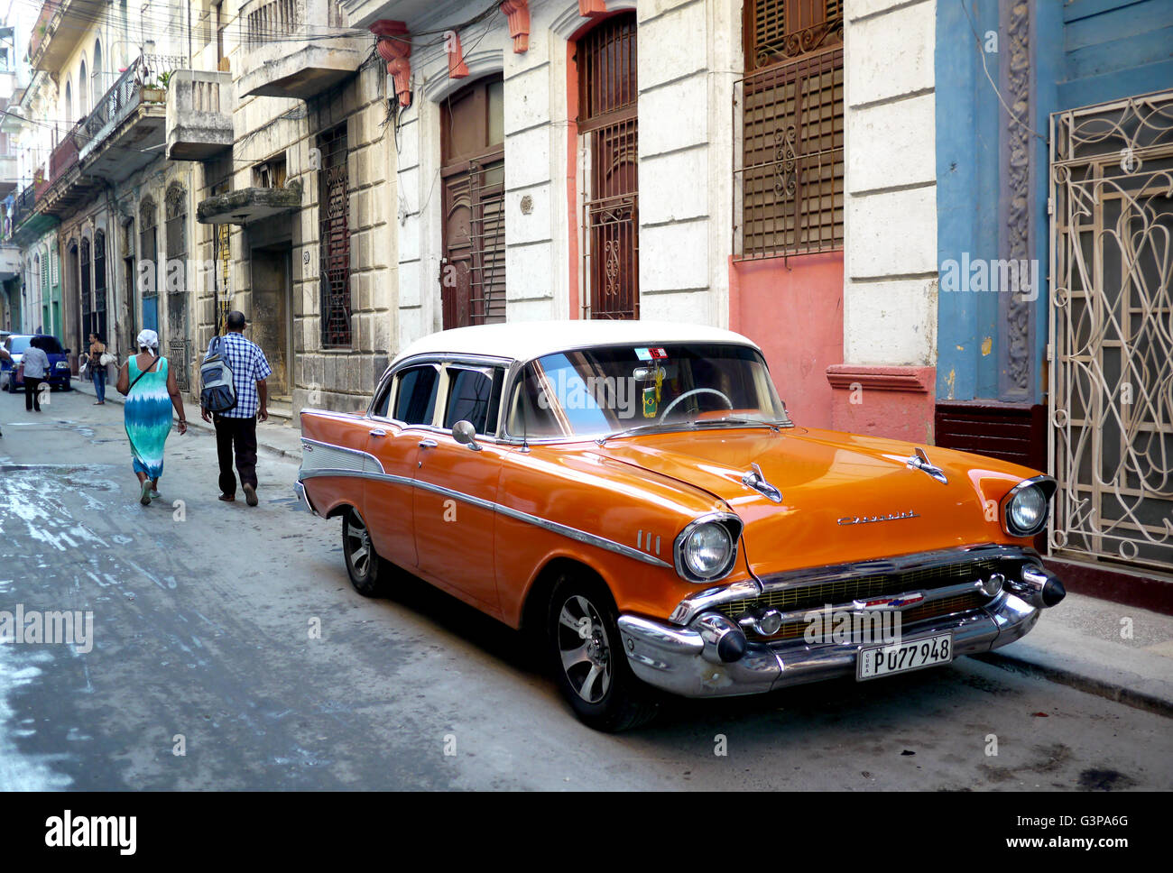 classic old orange american car in downtown havana, cuba Stock Photo