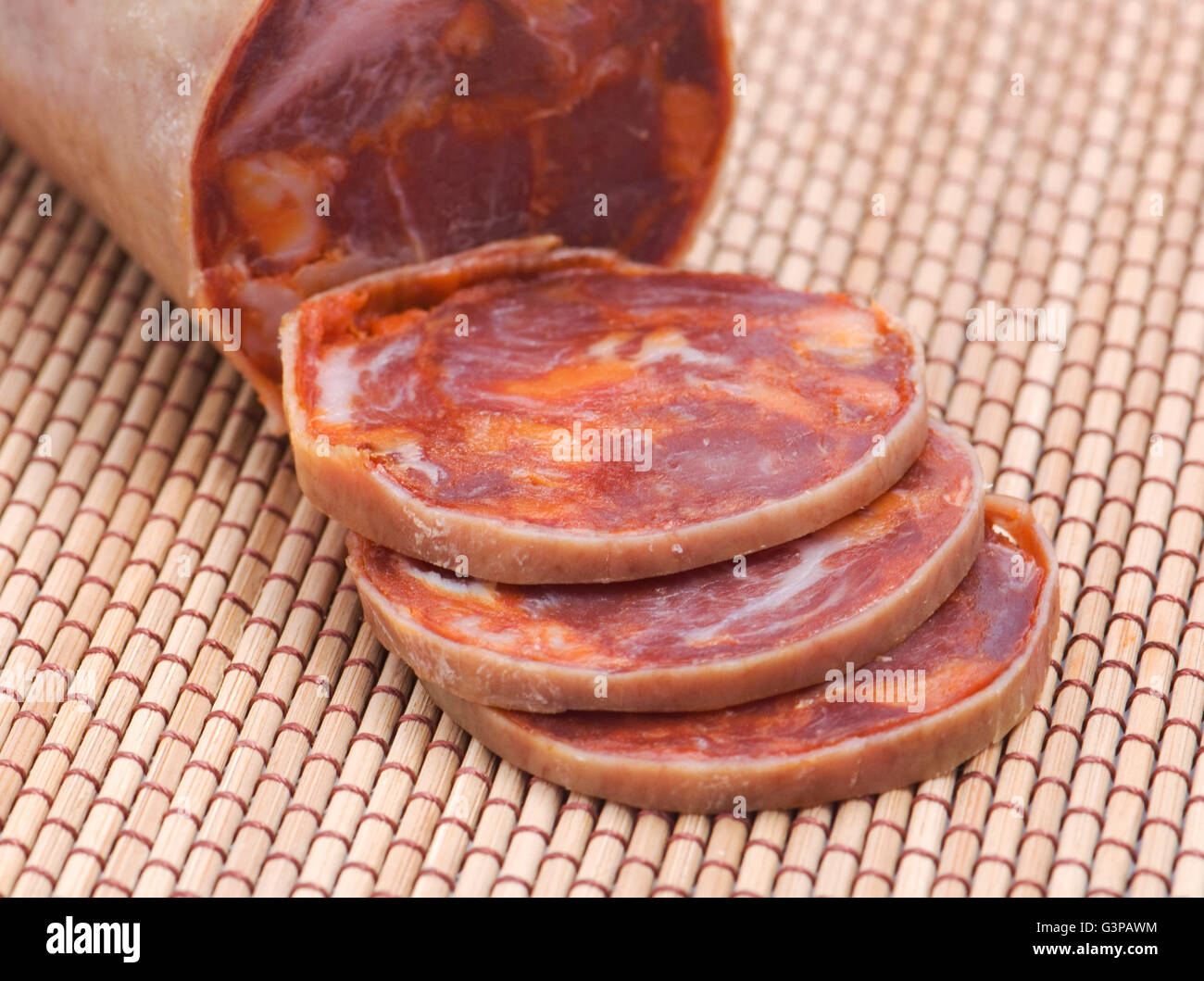 Chopped pork sausage on a cutting board Stock Photo