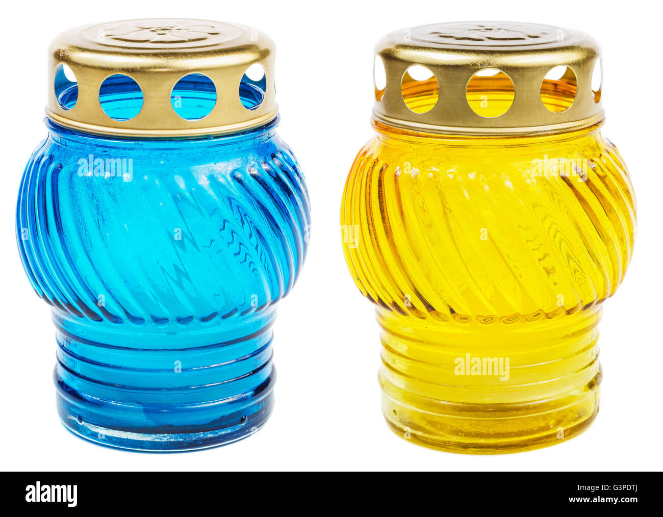 Blue and yellow votive candles isolated on white background with clipping path. Cemetery candles