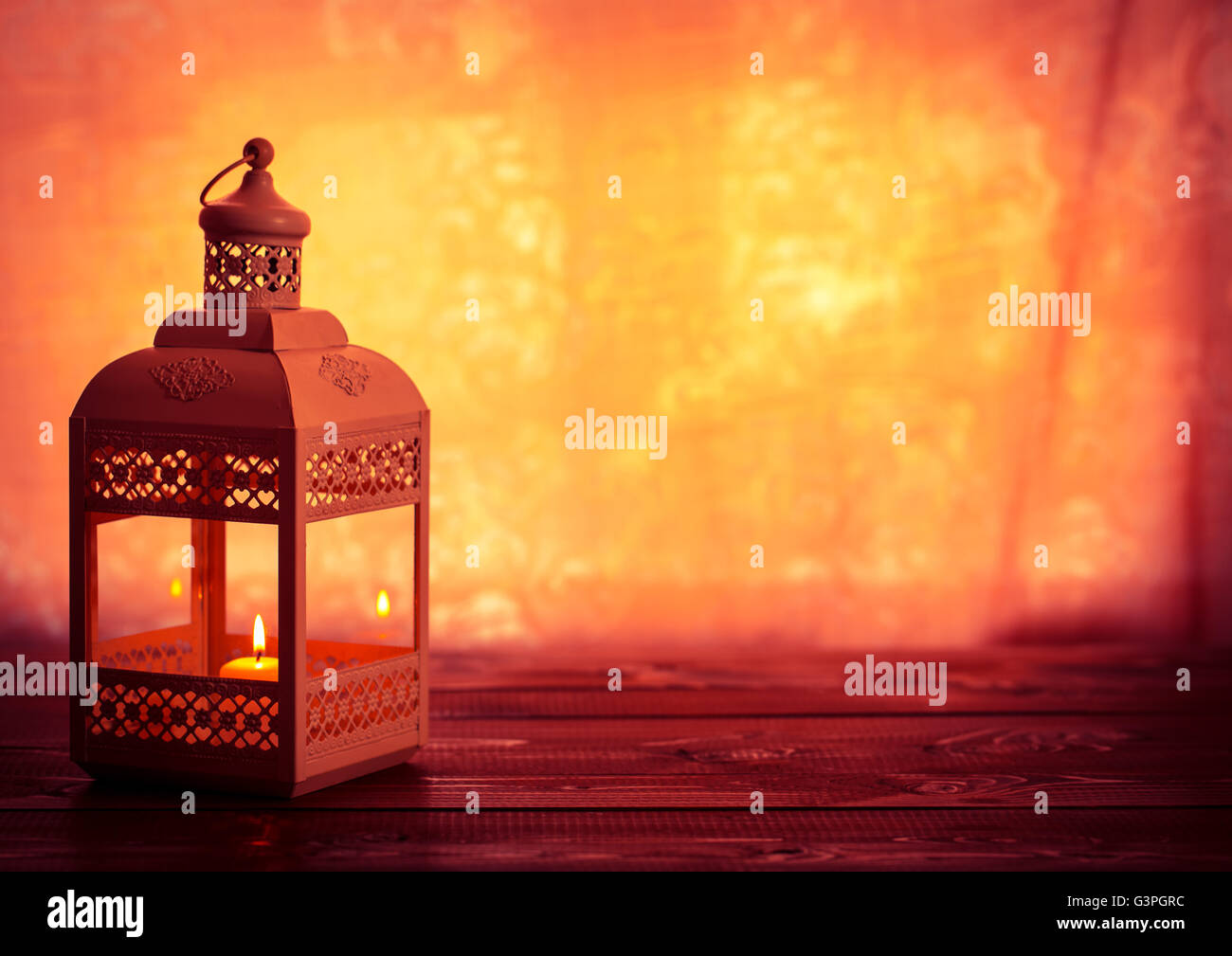 Beautiful background with a shining lantern Fanus. The Muslim feast of the holy month of Ramadan Kareem. Free space for your tex Stock Photo