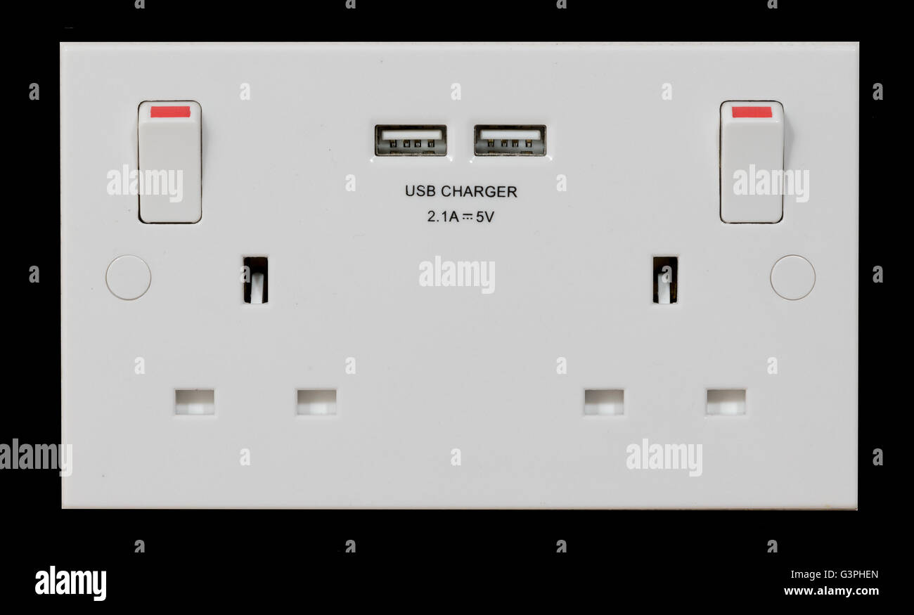 UK double plug socket with built in USB charger Stock Photo