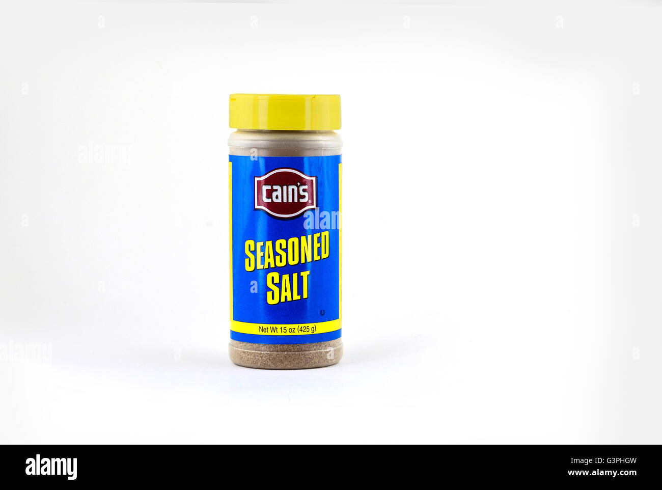 A plastic jar of Cain's brand Seasoned Salt isolated on white. USA. Stock Photo