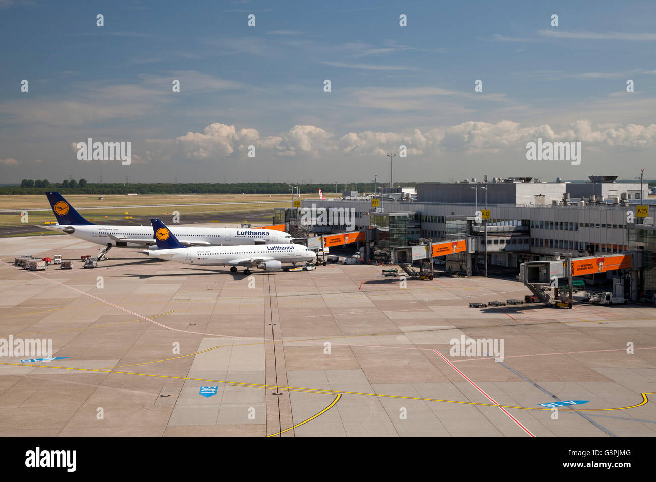 Lufthansa aircraft at the gate, Airbus A320-200 and Airbus A340-300, Duesseldorf Airport, Rhineland region Stock Photo