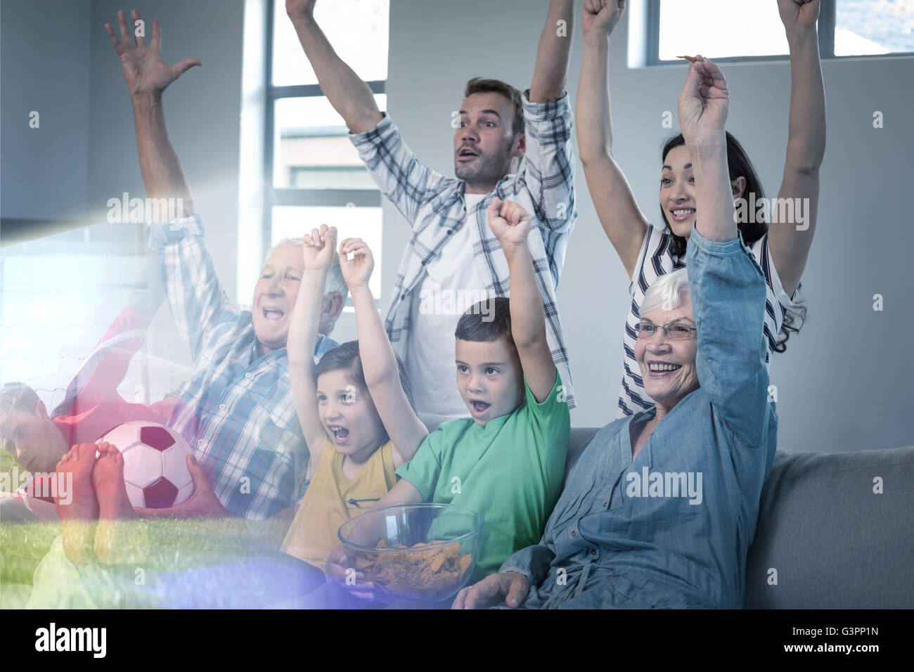Composite image of family is watching sport on television Stock Photo Alamy