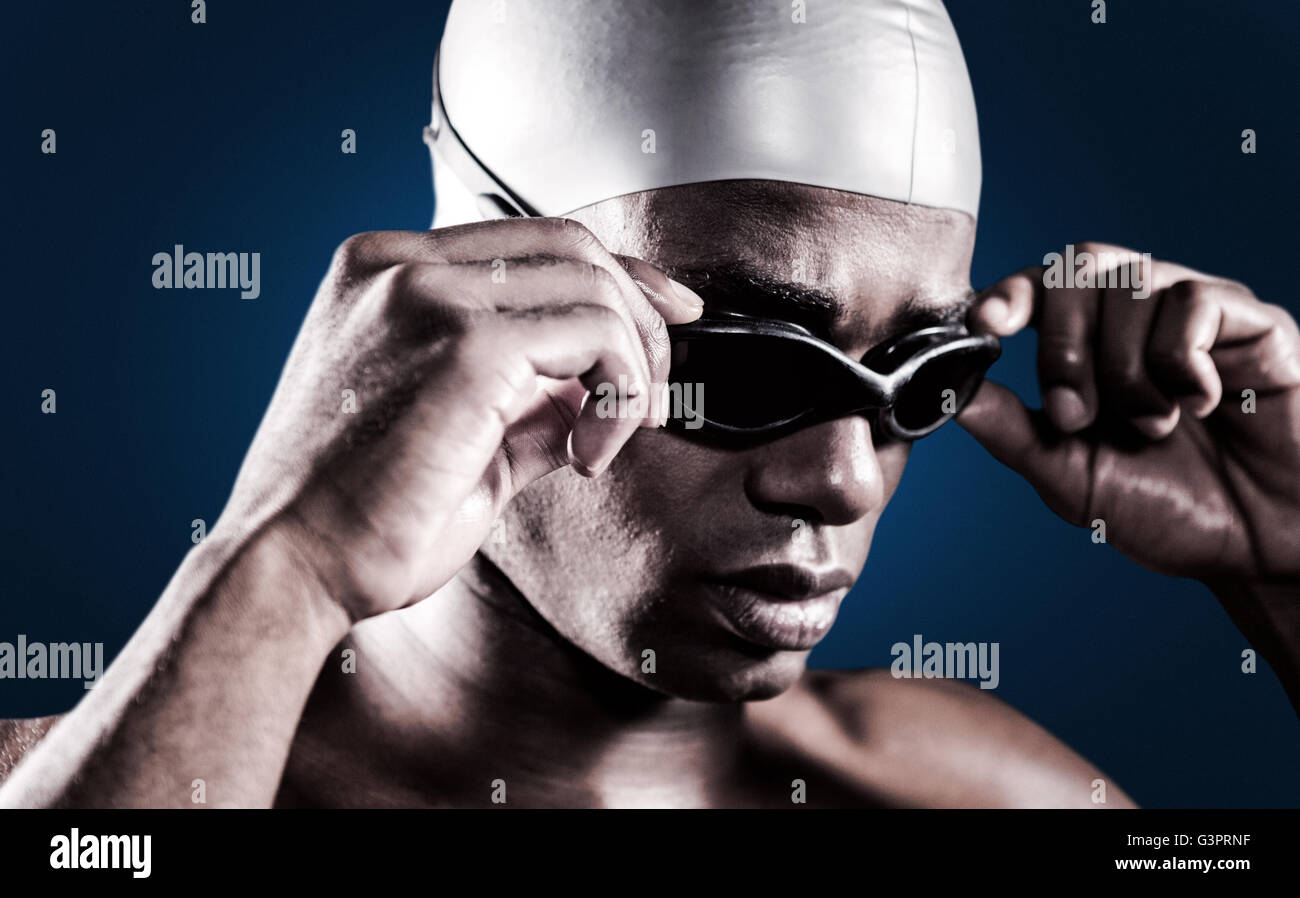 Composite image of swimmer ready to dive Stock Photo