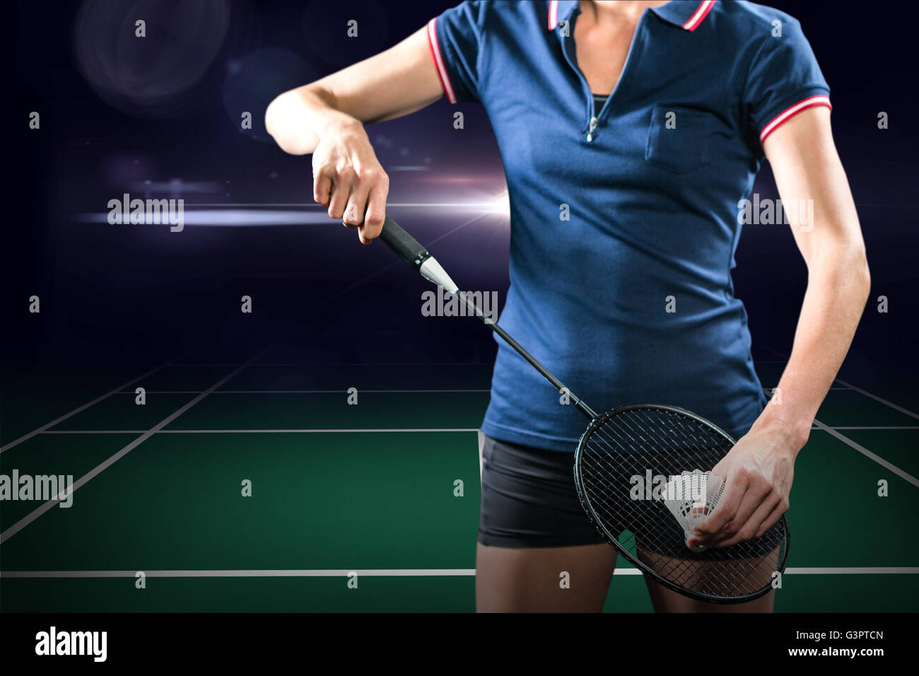 Composite image of badminton player holding a racket ready to serve ...