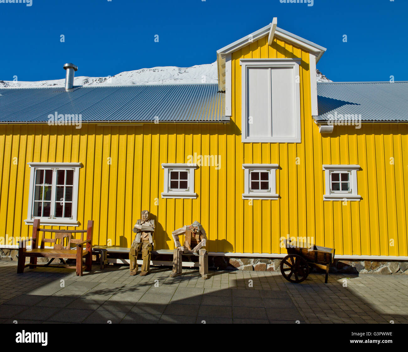 Hannes Boy Cafe with wooden statues, Siglufjordur, Iceland. A small village in the North of Iceland. Stock Photo