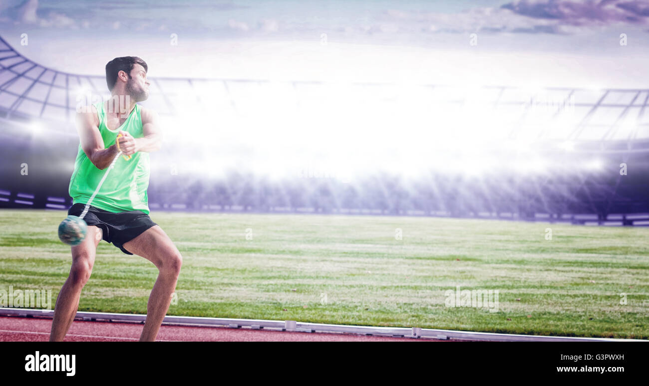 Sportsman throwing a hammer Stock Photo Alamy