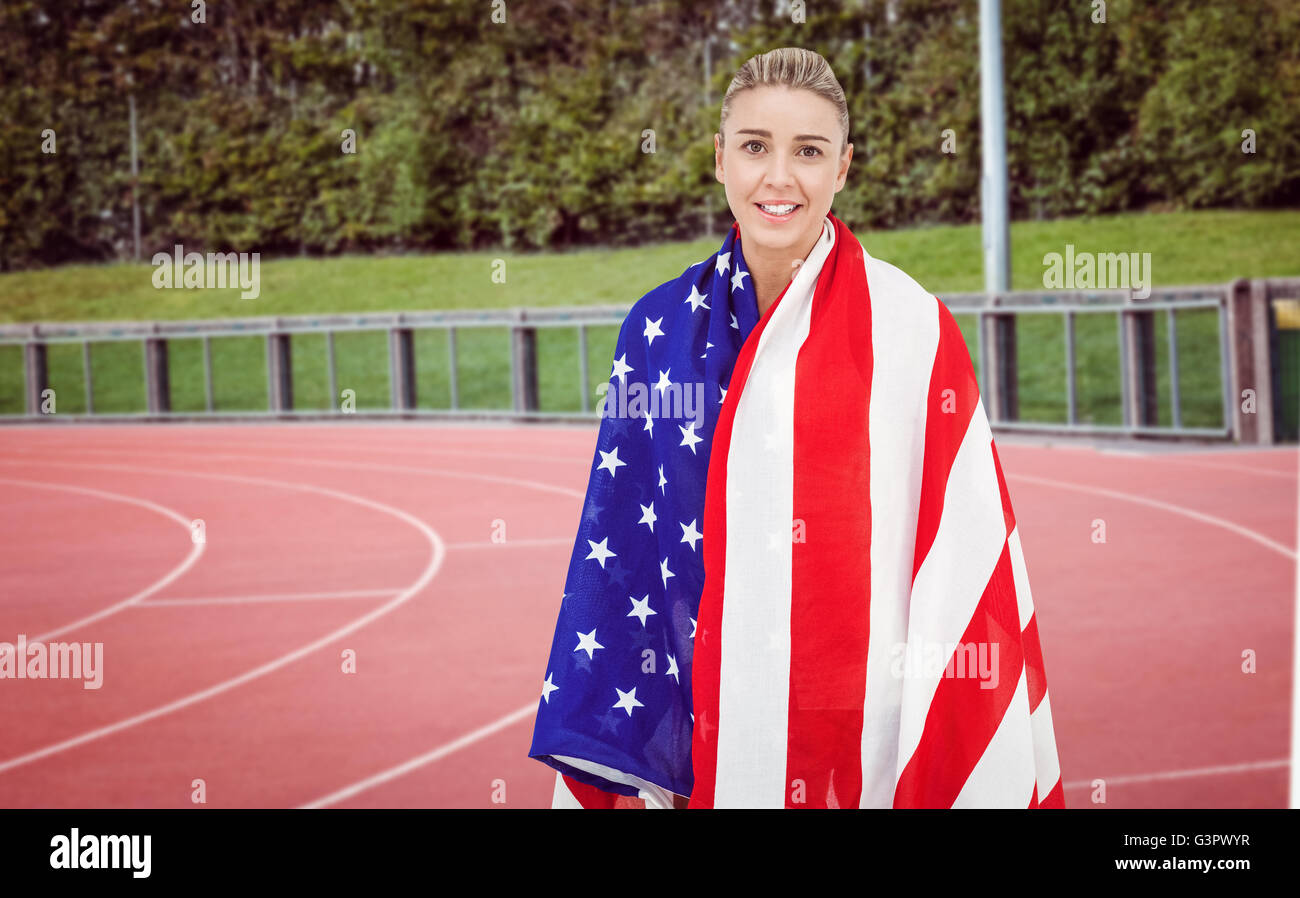 Female athlete with american flag on her shoulders Stock Photo - Alamy