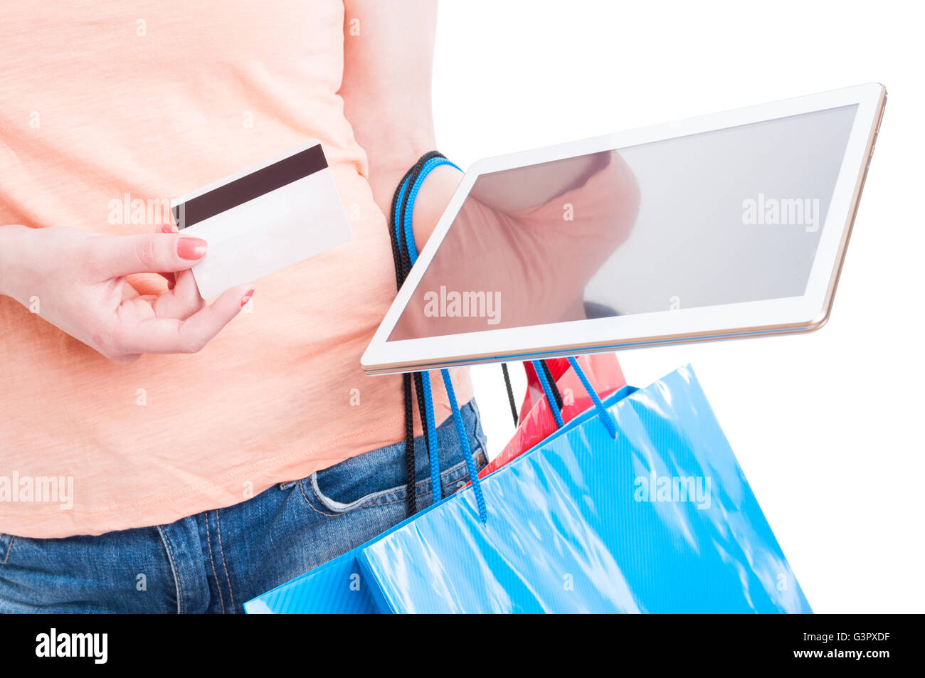 Female holding tablet and card as online shopping banking concept isolated on white background Stock Photo