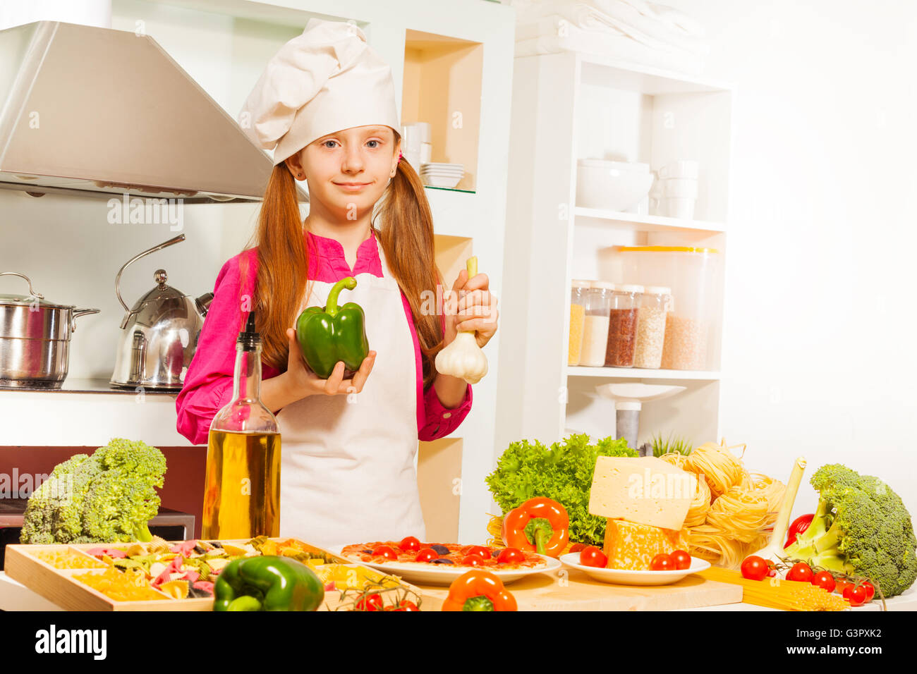 Young chief cook making healthy food Stock Photo