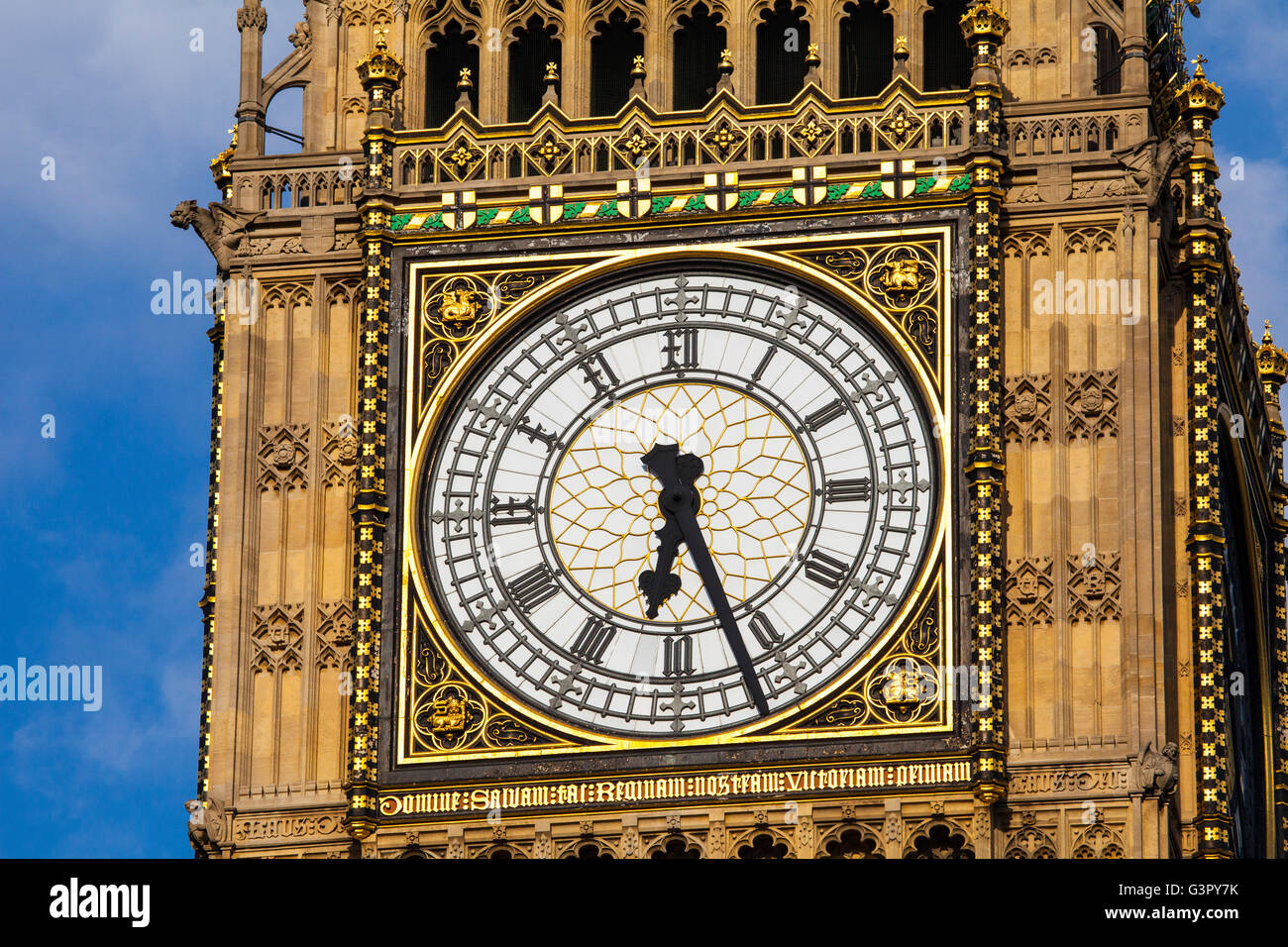 The clock face on the iconic Elizabeth Tower which is home to the historic bell named Big Ben. Stock Photo