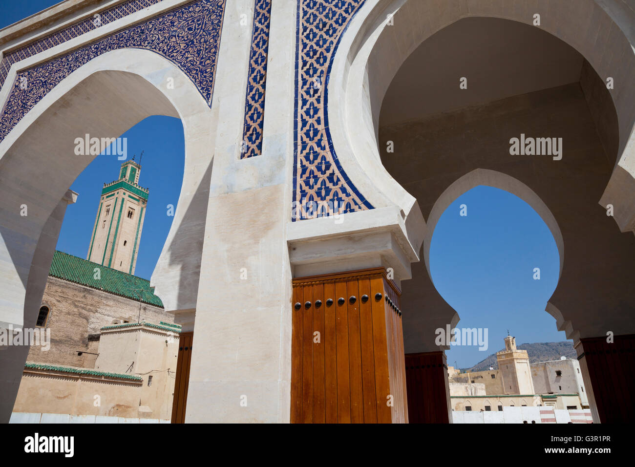 Mosque and city gate in Fez ( Fes Fas ) city, UNESCO heritage site in Morocco, Africa Stock Photo
