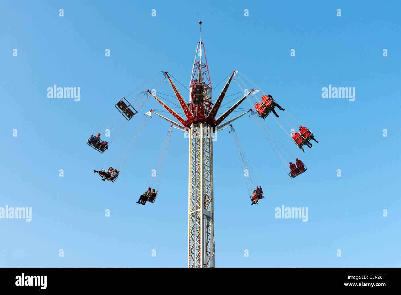 Sky high swings fairground ride, England, UK Stock Photo
