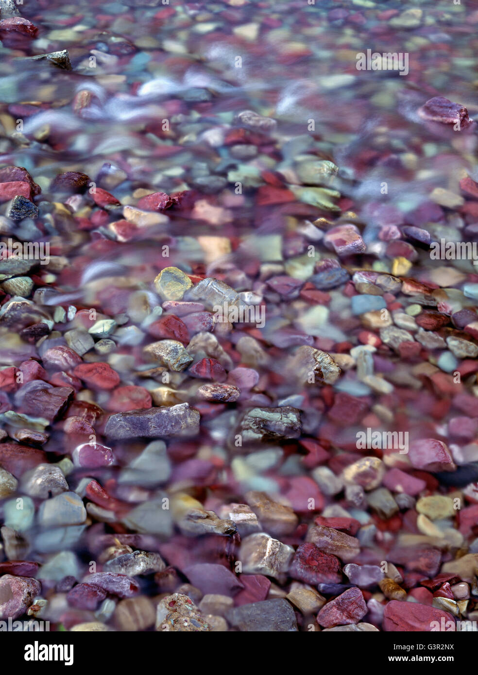 USA, Montana, Glacier National Park, Varied rocks including reddish ...