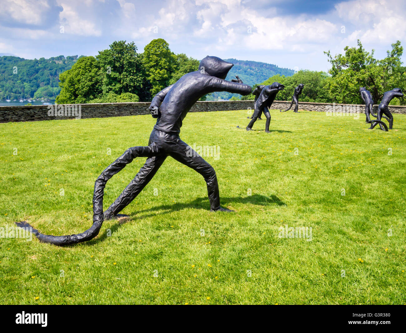 Days of Judgment an installation of bronze statues of cats dressed as