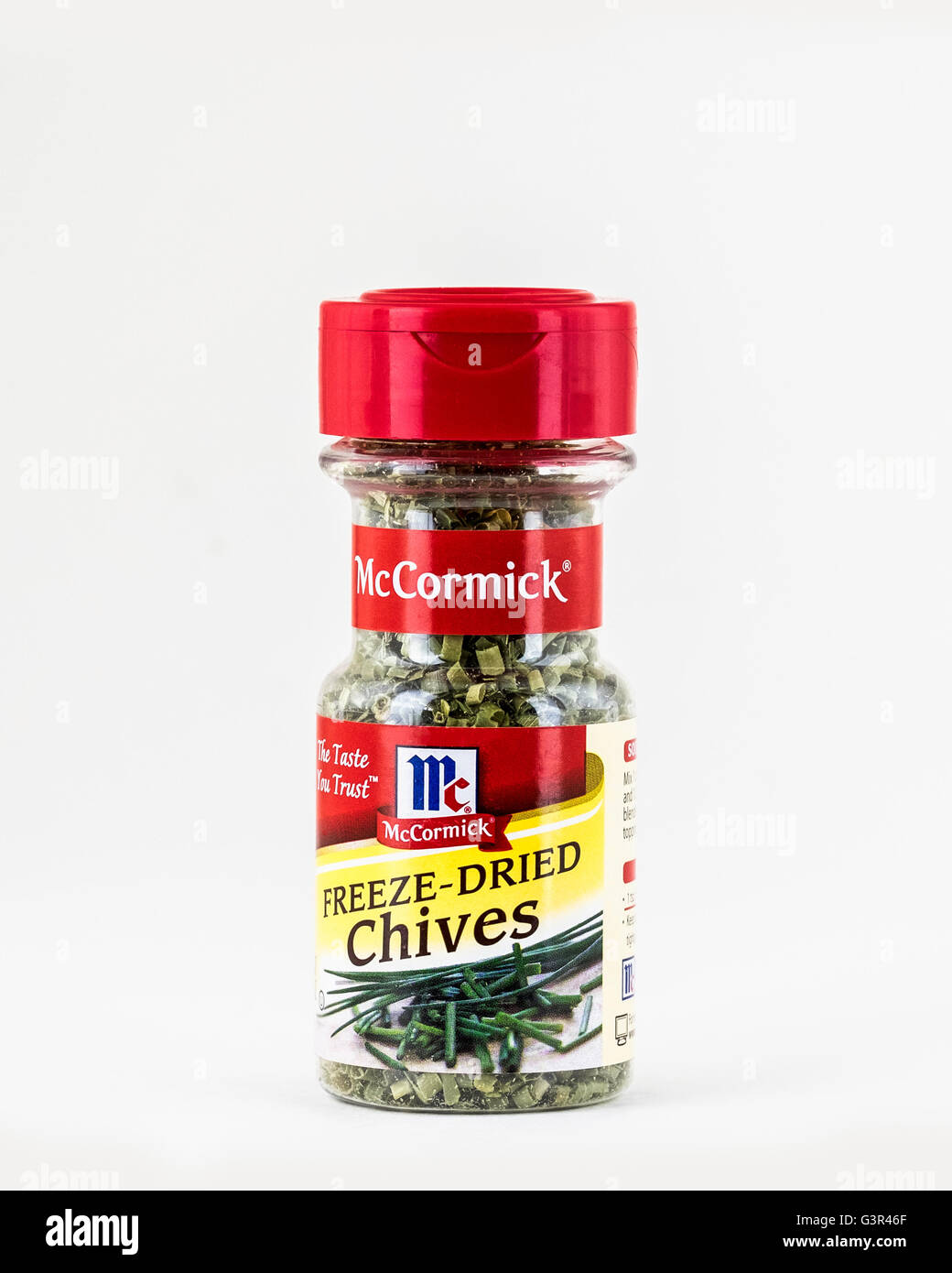 A jar of McCormick brand Freeze-Dried Chives. Cutout, USA. Stock Photo