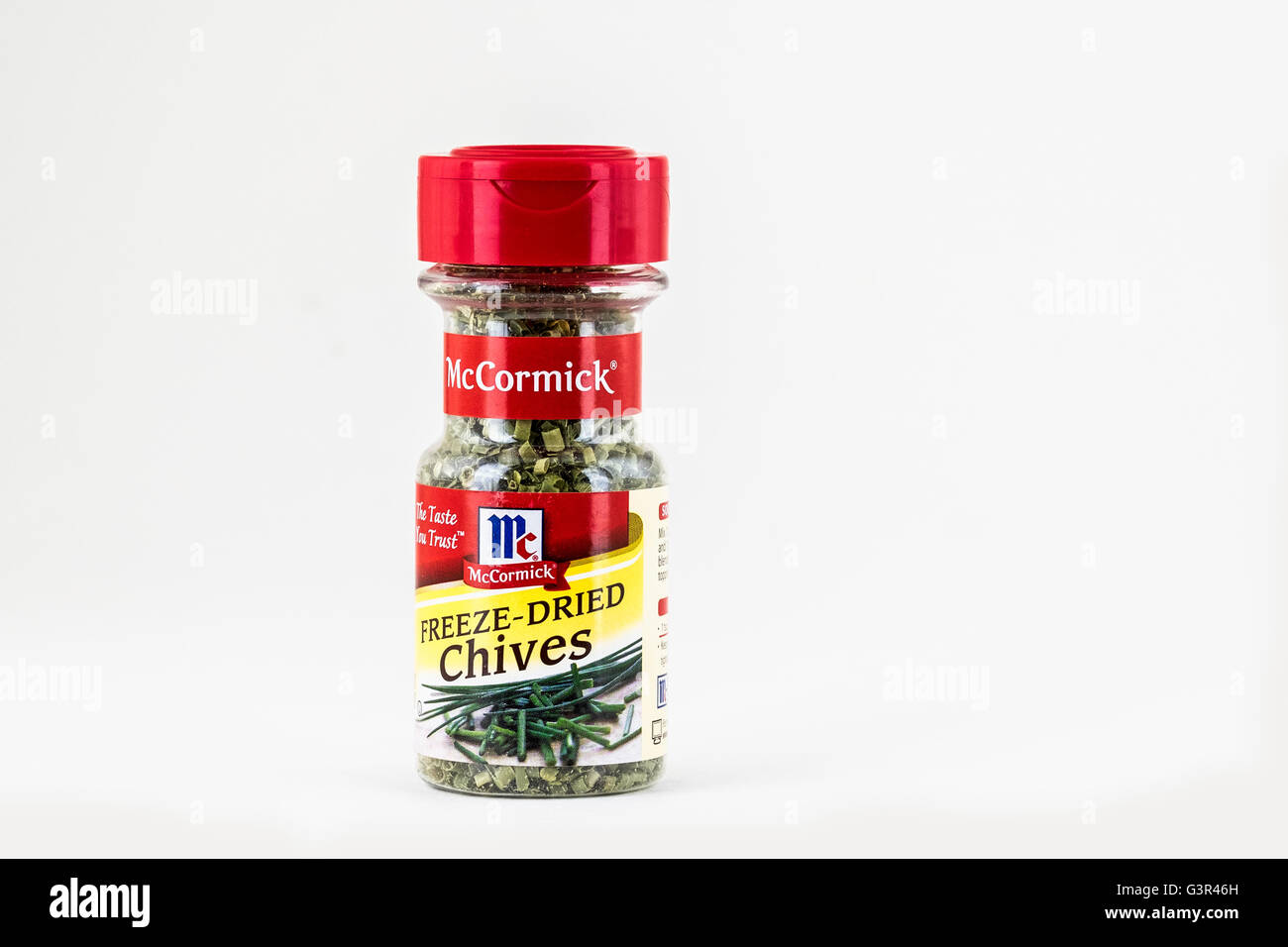 A jar of McCormick brand Freeze-Dried Chives. Cutout, USA. Stock Photo