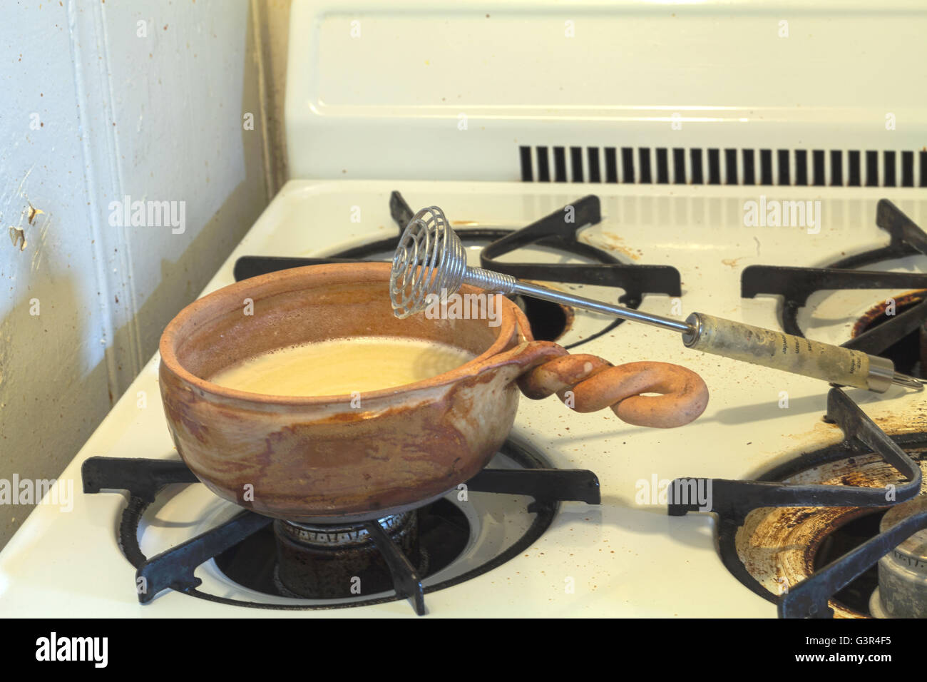 bread making series. Four tablespoons of butter with one cup of milk