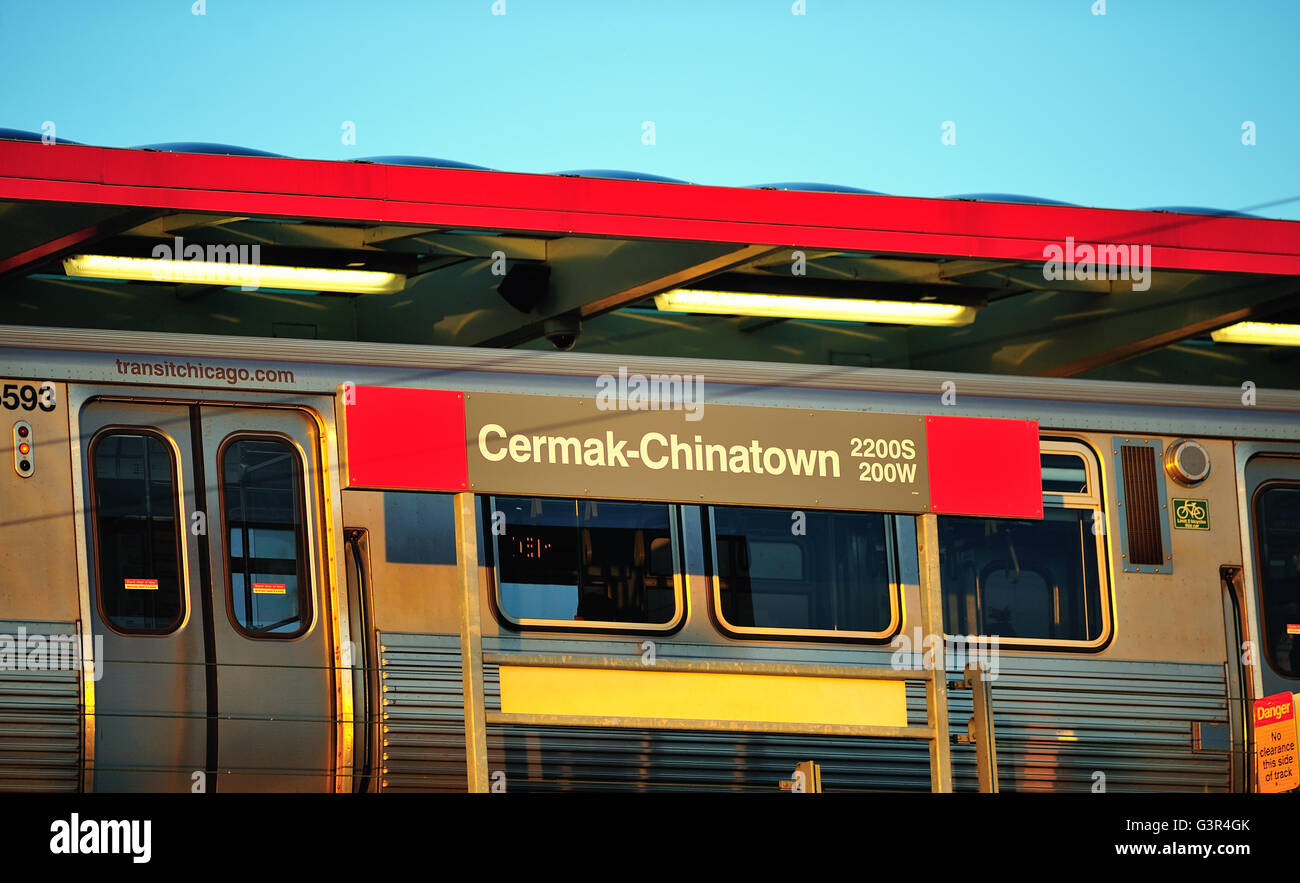 A CTA Red Line rapid transit train paused at Chicago's Chinatown stop on the city's near south