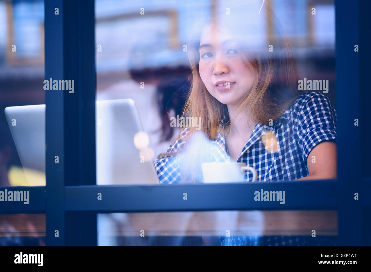 Portrait asia young woman working on laptop in coffee shop, Vacations ...