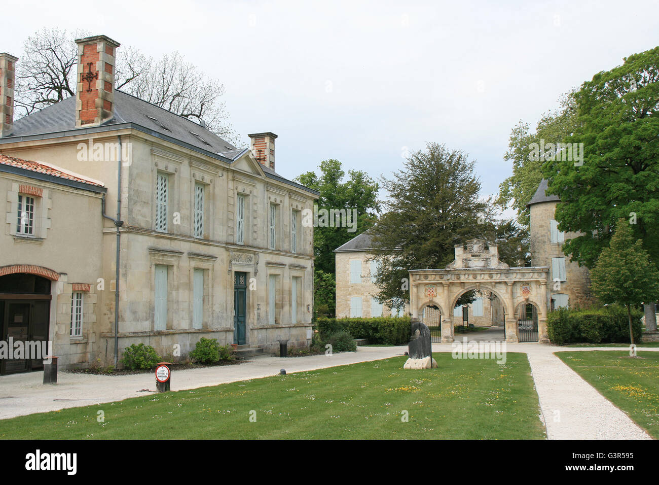 Old rectory and Renaissance gate in Surgères (France). Stock Photo