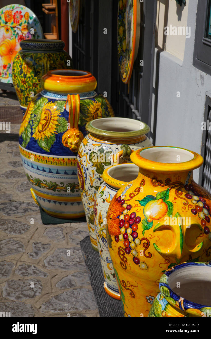 Large pots urns Majolica from Italy Amalfi coast big statement peaces of traditional ware ceramics floor and wall tiles Spanish. Stock Photo