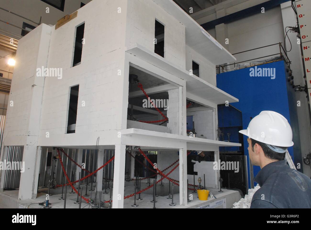 Pavia (Italy), EUCENTRE - European Center for Earthquake Engineering,  control of the damages produced on a small building half size of natural in  reinforced concrete and bricks Stock Photo - Alamy