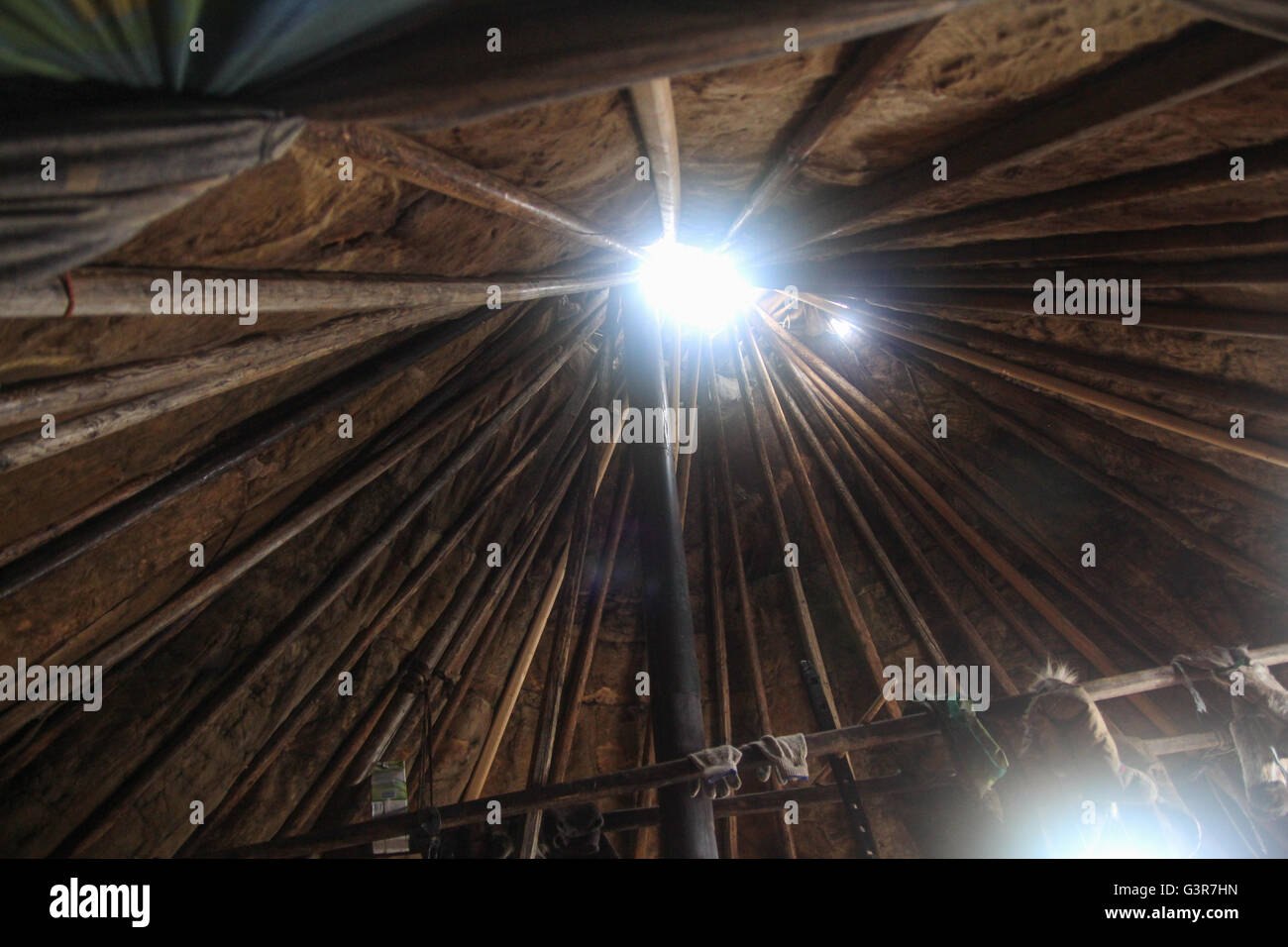 The hole at the top of the chum-traditional dwellings of Nenets reindeer breeders. The Yamal Peninsula. Stock Photo