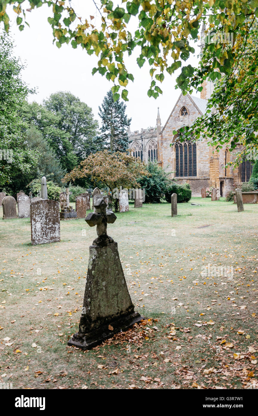 Tombstones at an old graveyard in the Holy Trinity Church in Stratford Upon Avon, UK. Cloudy day Stock Photo
