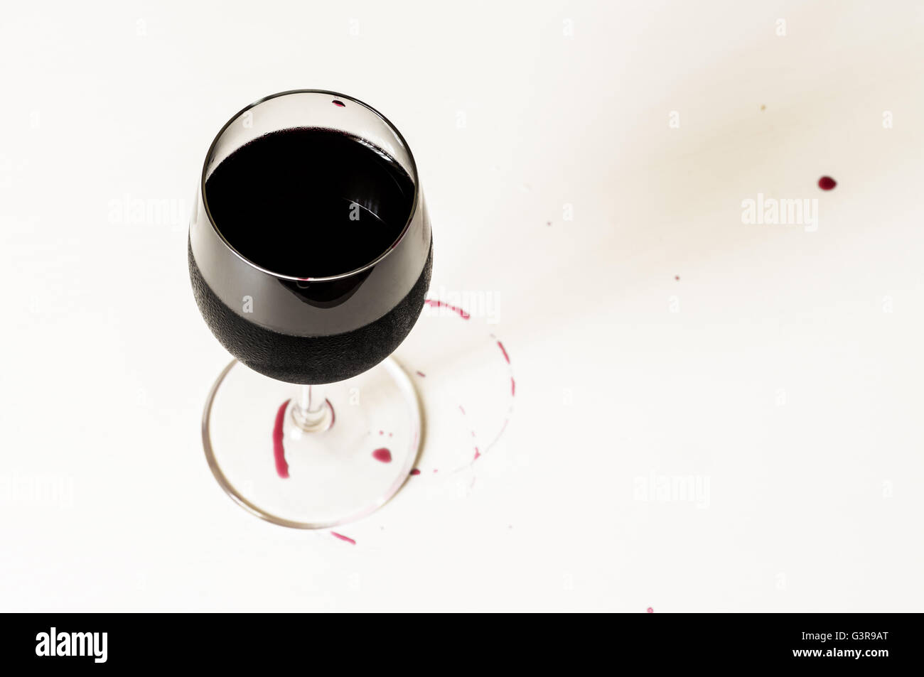 Cold wine Cabernet or Merlot top view and stains on the table Stock Photo