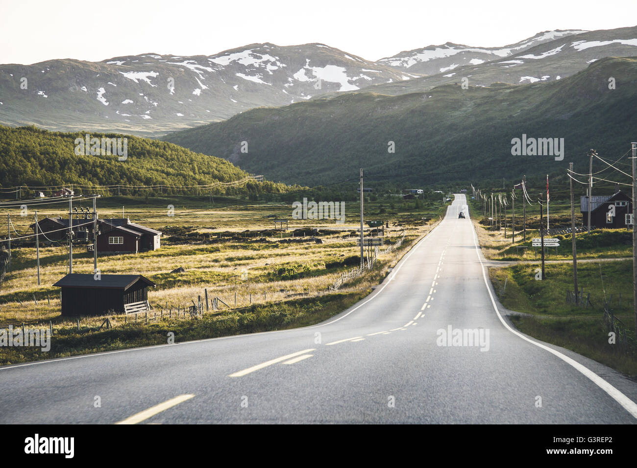 A road strething endlessly somewhere in Norway Stock Photo